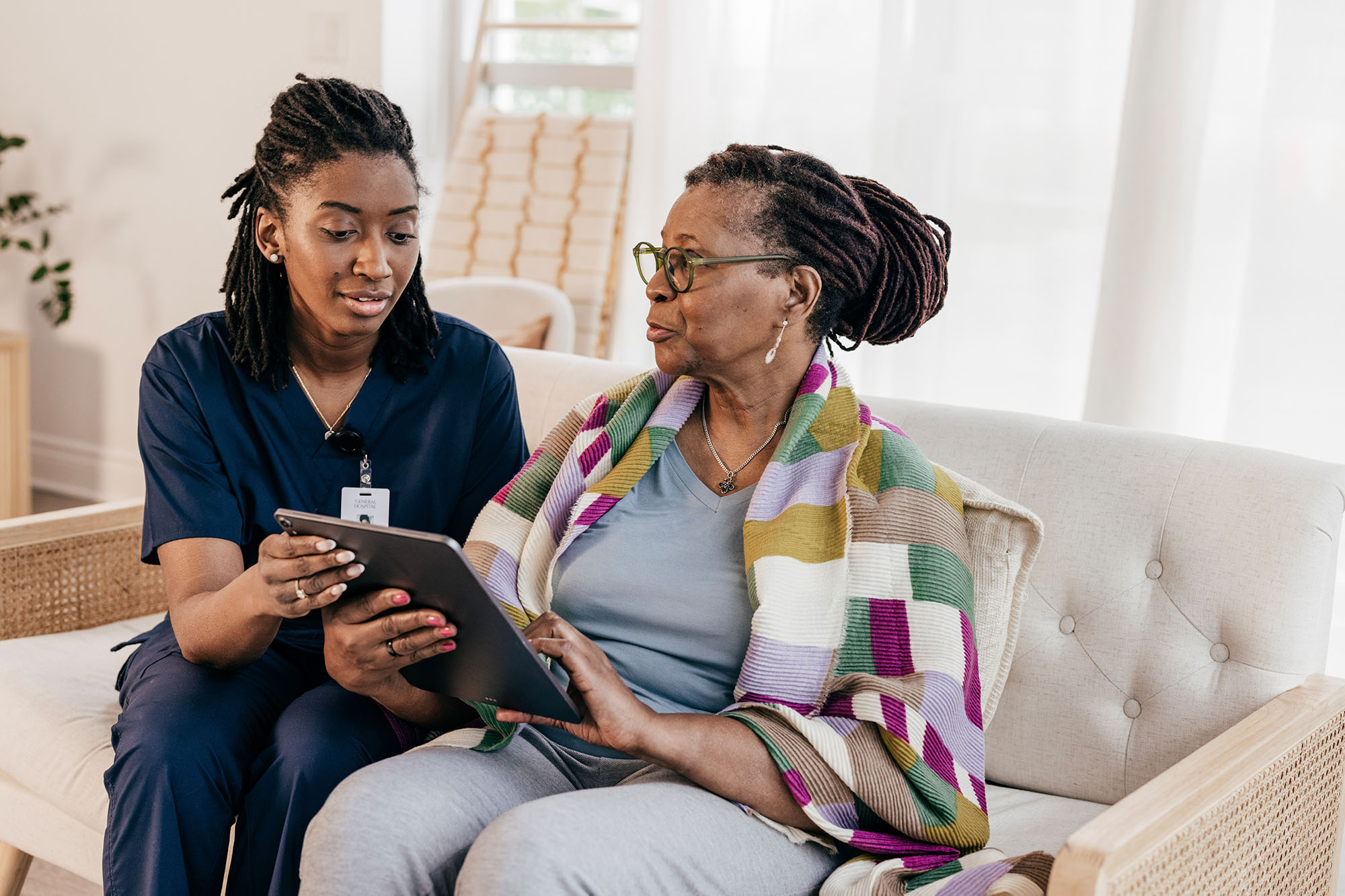 Home health care worker with client