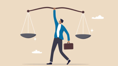 Man balancing ccales