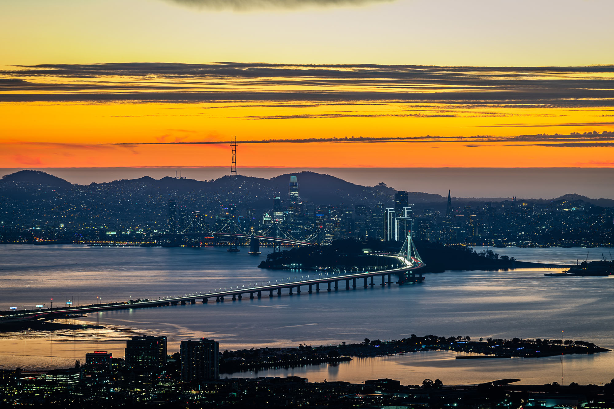 San Francisco as seen from the East Bay withthe Bay Bridge in the foreground.