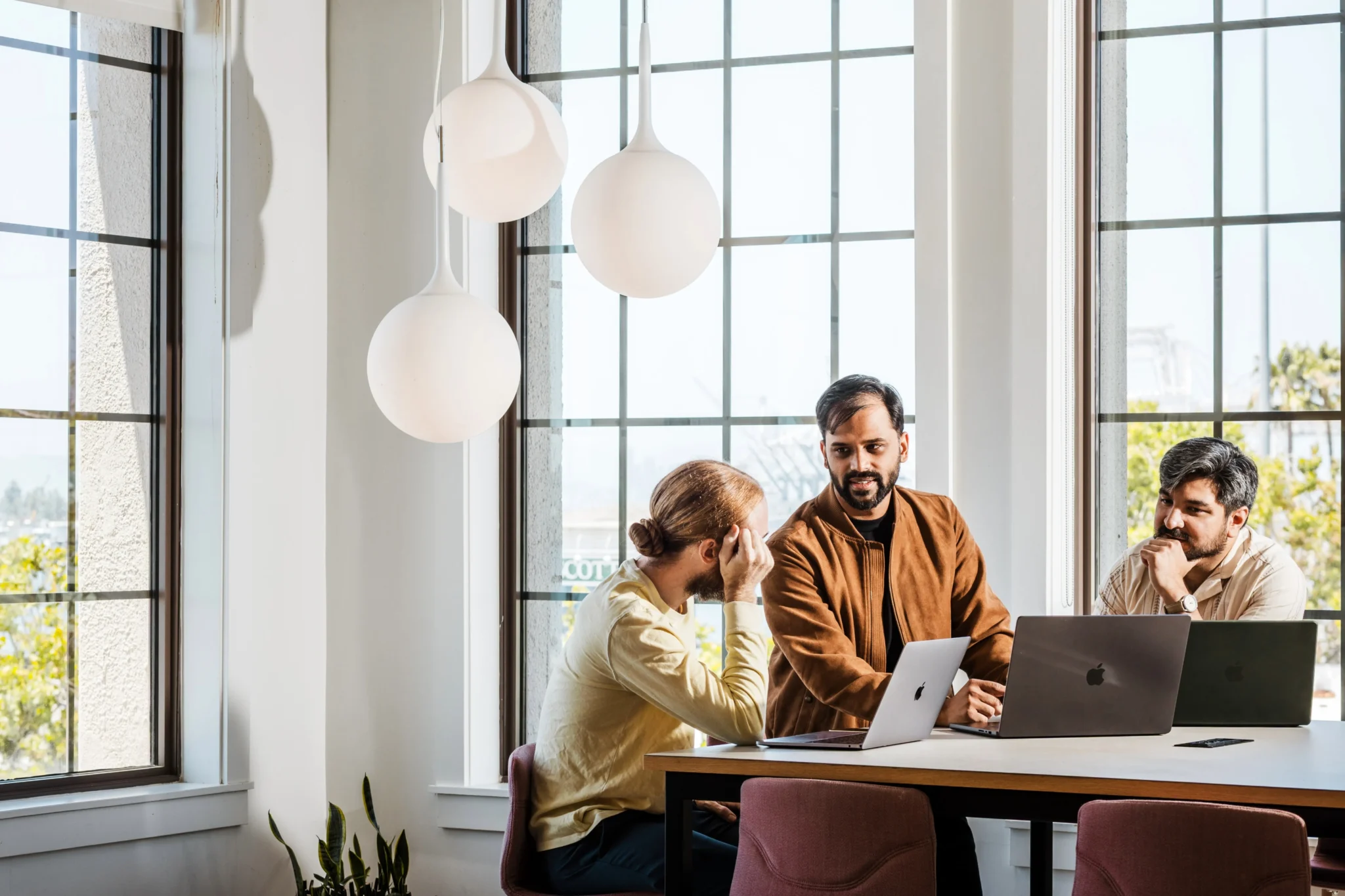 Mother and daughter talking to doctor on a telehealth visit